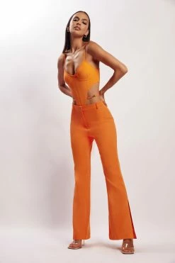 WXI All Tops Steph Cut Out Bodysuit With Hardware - Tangerine 14 WXI All Tops Steph Cut Out Bodysuit With Hardware - Tangerine